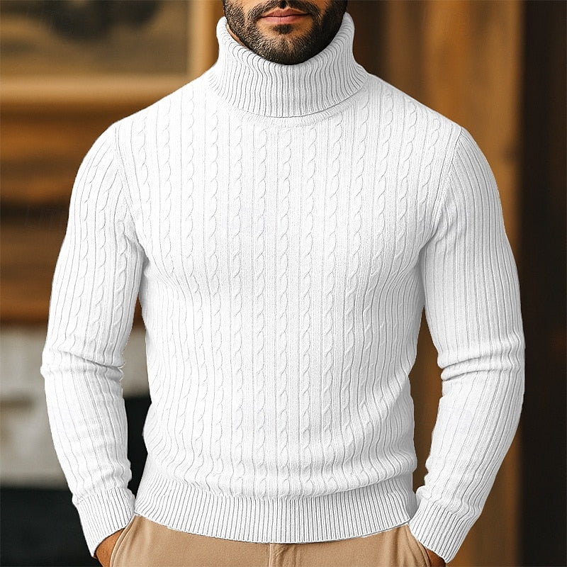 Man wearing a white cable-knit turtleneck jumper