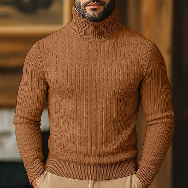 Folded mens cable knit turtleneck jumper showcasing soft knit fabric