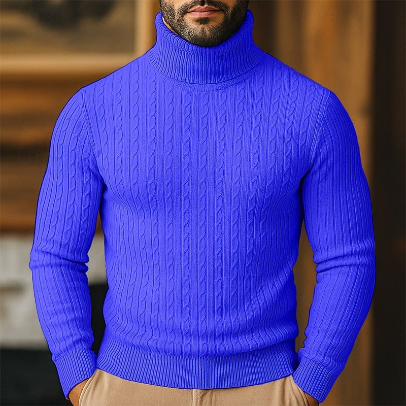 Man wearing a vibrant blue cable-knit turtleneck jumper
