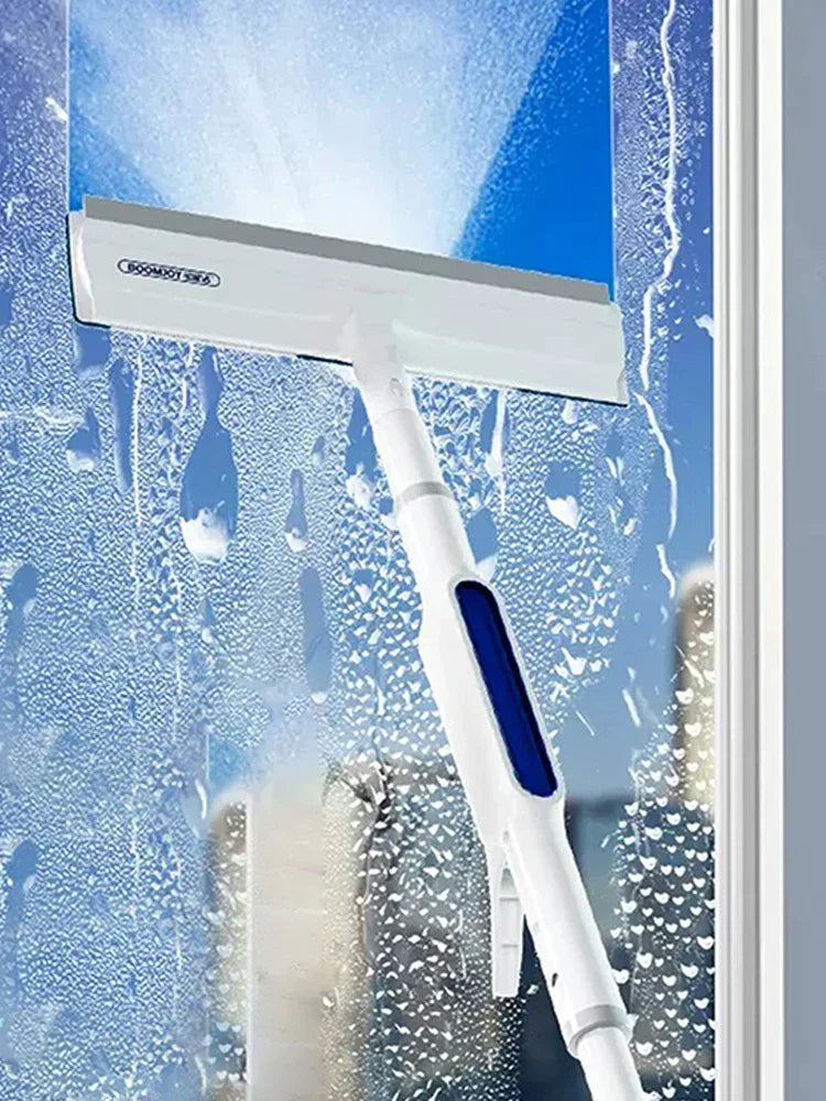 3-in-1 window squeegee wiping a wet glass surface cleanly