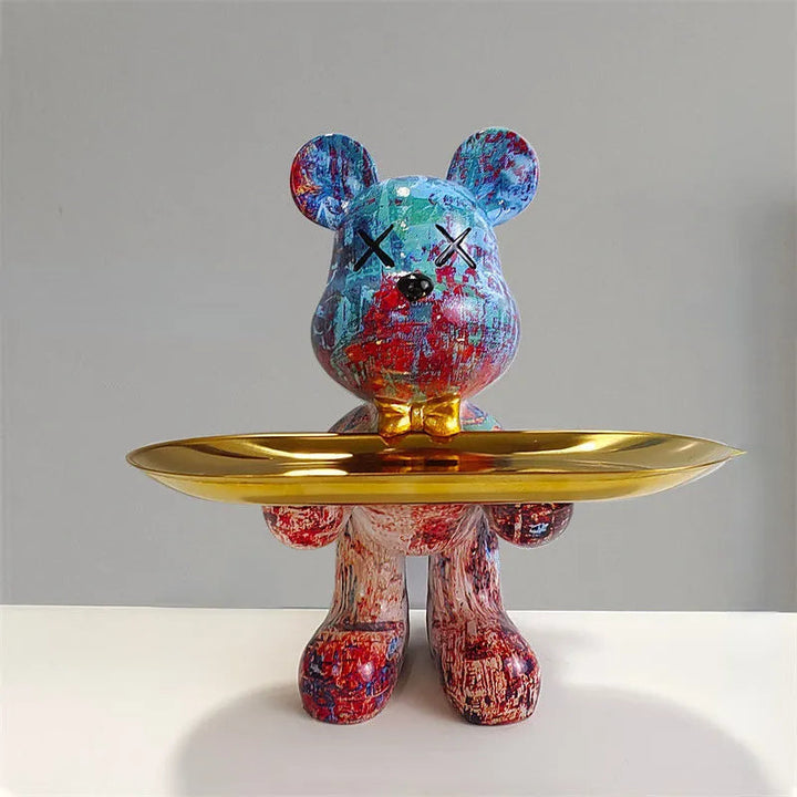 Resin art bear sculpture featuring a convenient storage dish