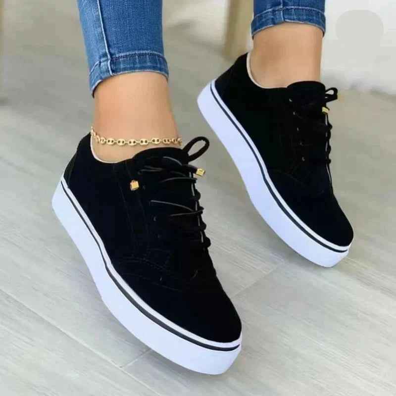 Comfortable casual walking sneakers in action pose on female feet