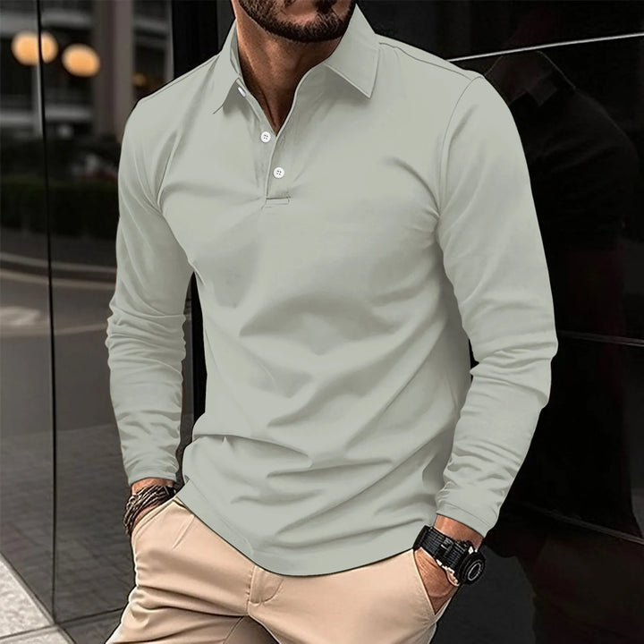 Close-up of the collar and button placket on a men's long-sleeve polo shirt