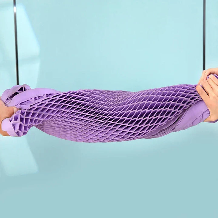 Flexible TPE pillow being stretched to show durability