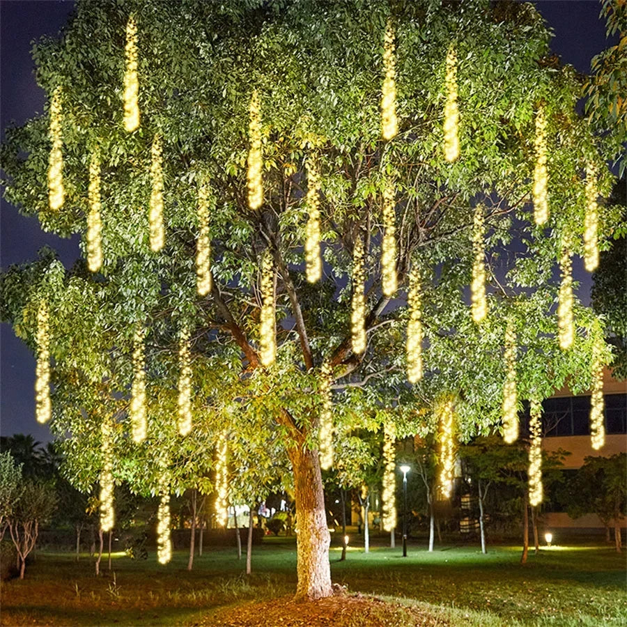 LED string lights glowing with a cascading meteor shower effect for outdoor garden and party decor