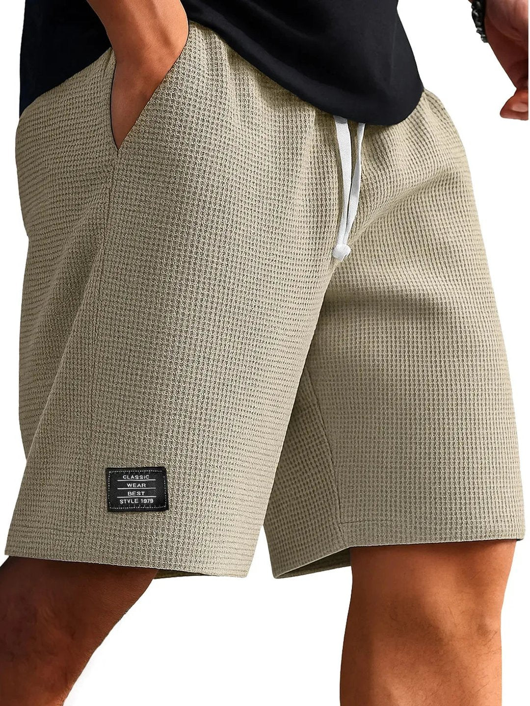 Flat lay of men's activewear shorts displaying versatile summer style