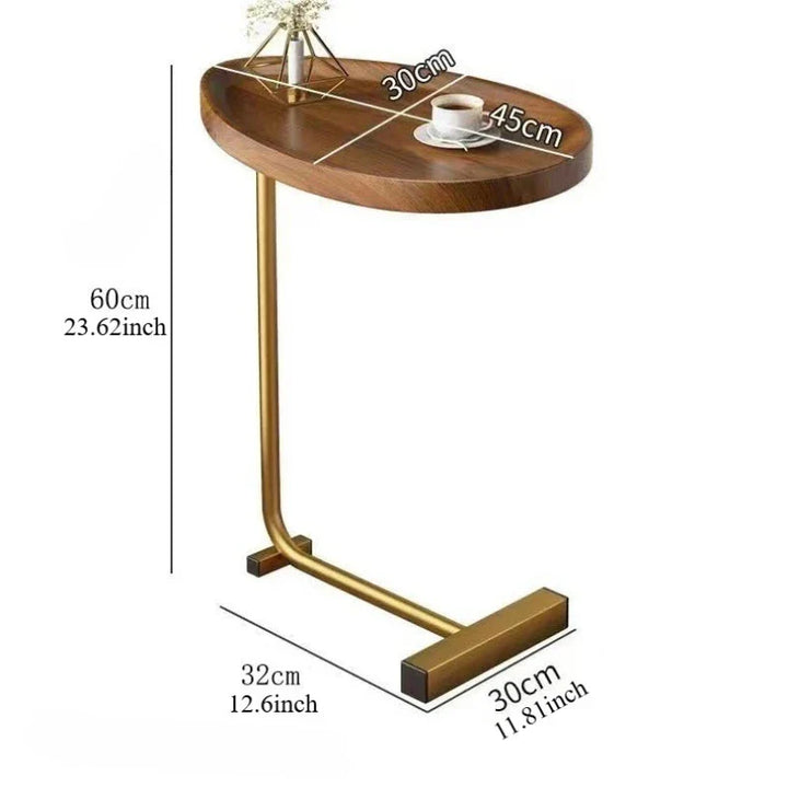 Small space bedside table with rolling casters positioned next to a modern bed