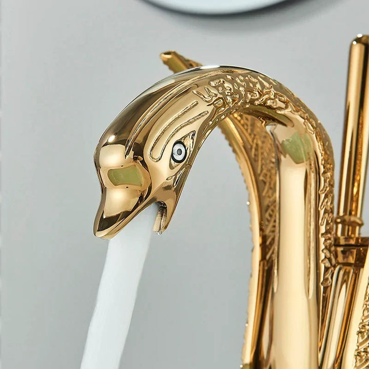 Detailed shot of a gold swan tap head showing exquisite detailing