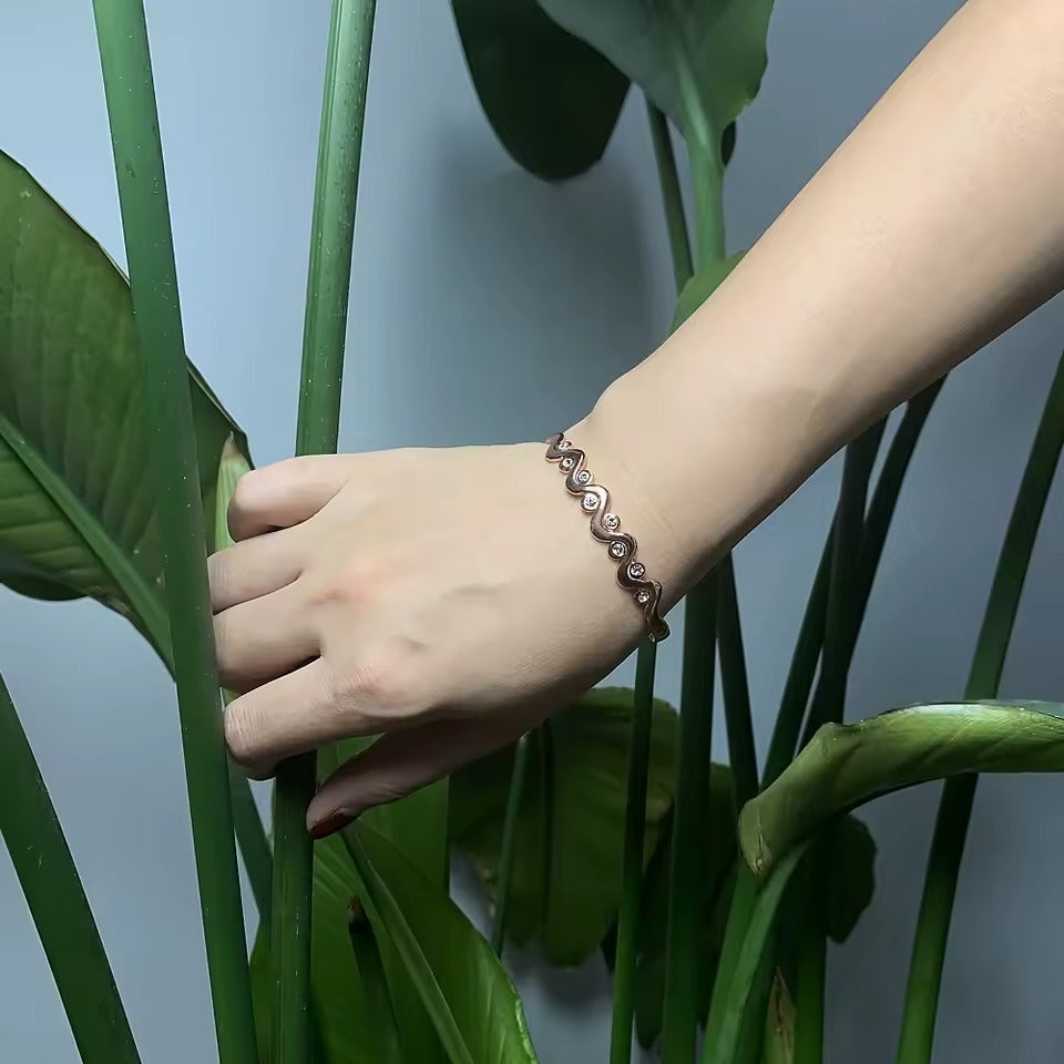 Casual wear copper bracelet showcasing its polished finish and smooth curves