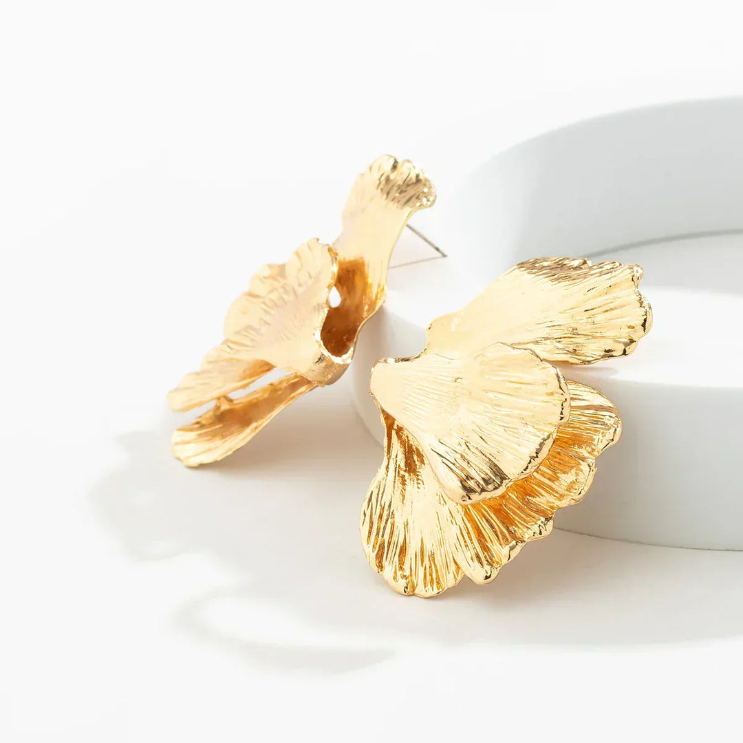 Close-up of statement petal drop earrings for women