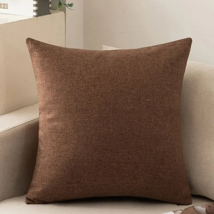 Dark brown decorative cushion showcasing texture