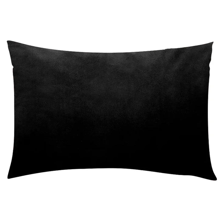 Solid black rectangular velour cushion cover displayed against a plain background.
