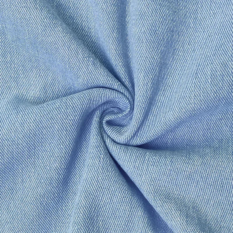 Close-up view of the lightweight blue fabric texture