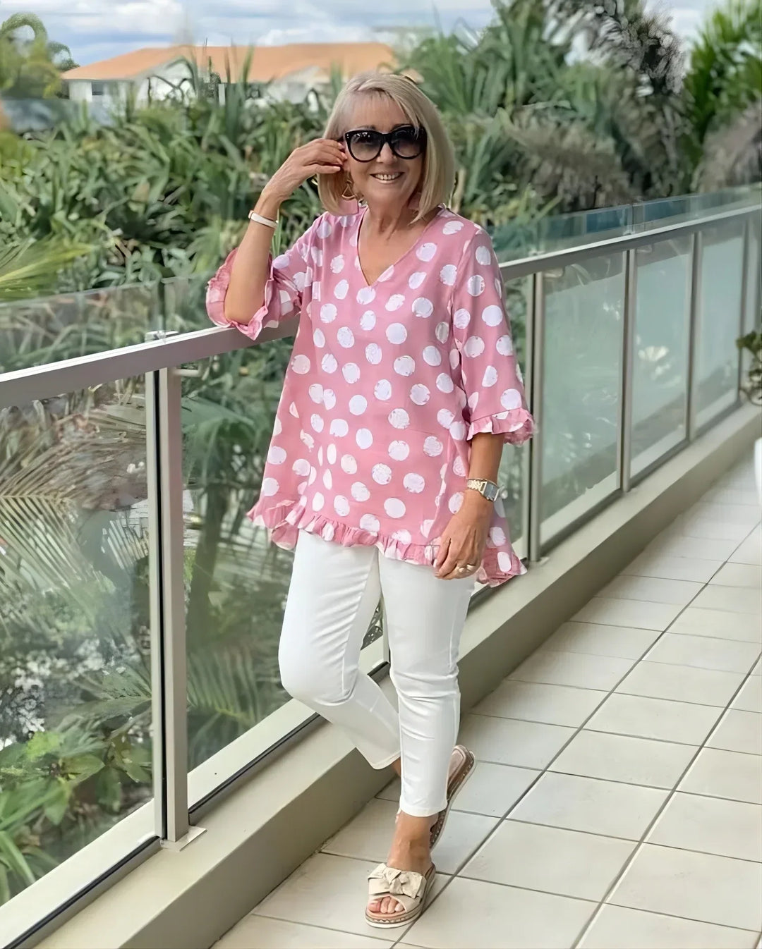 Back view of casual half sleeve polka dot top for women