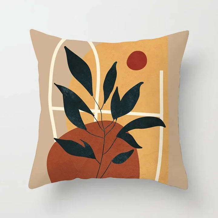 Close-up of botanical print throw pillow case showing soft velvet texture