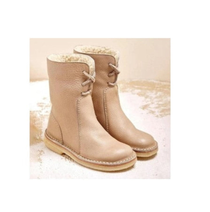 Side view of casual cold weather ankle boots with stylish side zipper detail