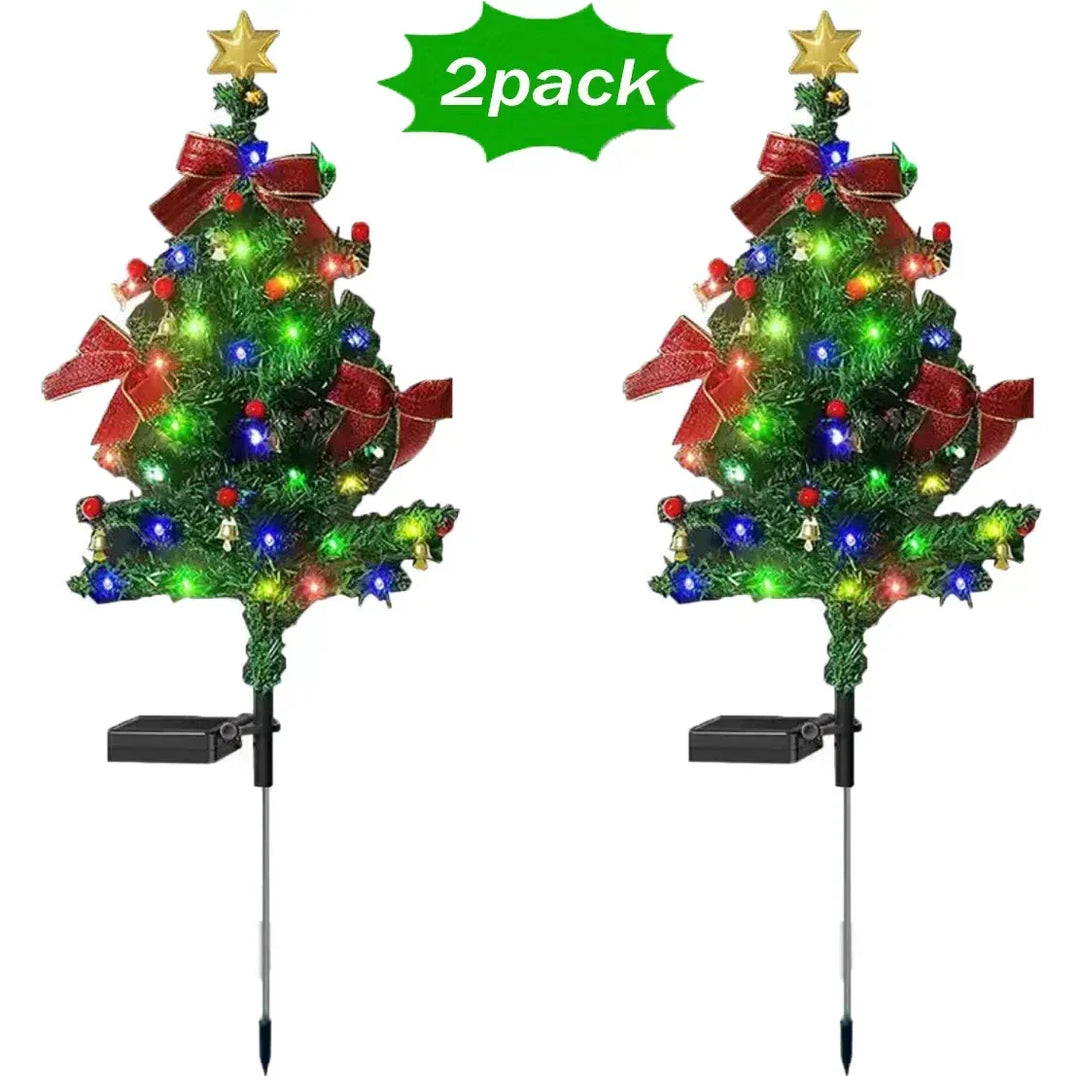 Close up of solar powered glowing LED Christmas tree light