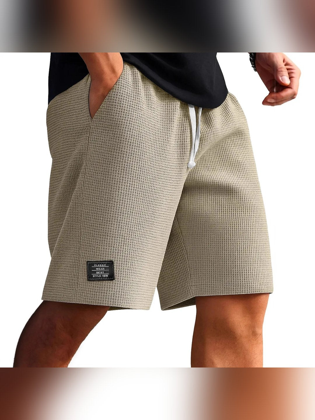 Drawstring closure detail on men's casual activewear shorts