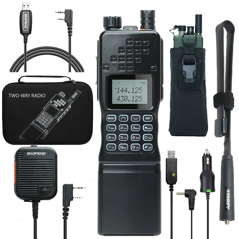 Tactical gear walkie talkie held firmly in hand for size comparison