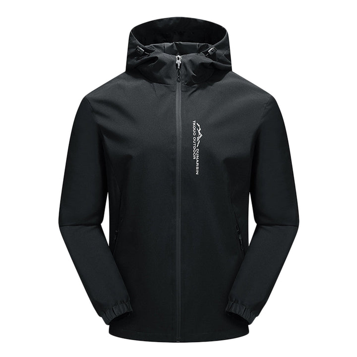 Women's windproof hooded outdoor jacket in action during a hike
