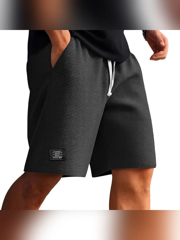 Lifestyle shot of men wearing breathable shorts during summer outdoor activities