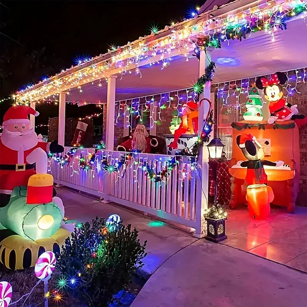 Solar Christmas string lights illuminating a decorated porch and railing at night