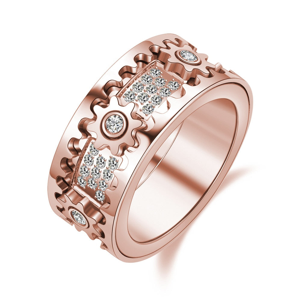 Unisex Spinfinity relaxing spinner ring in silver and rose gold with sparkling zircon stones.
