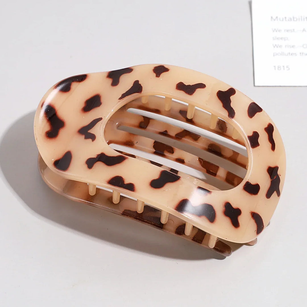 Fashionable hair accessory showcasing a sleek flat oval shape design