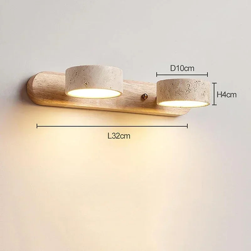 Close-up view of the natural stone texture on the modern wall sconce