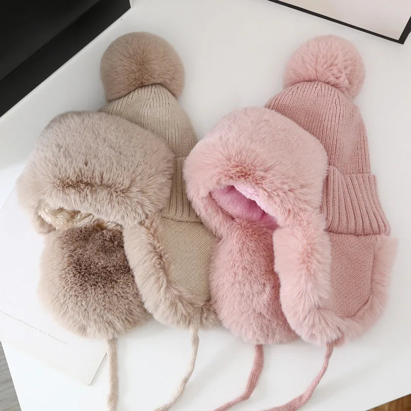 Assorted colors of fleece-lined winter caps displayed together