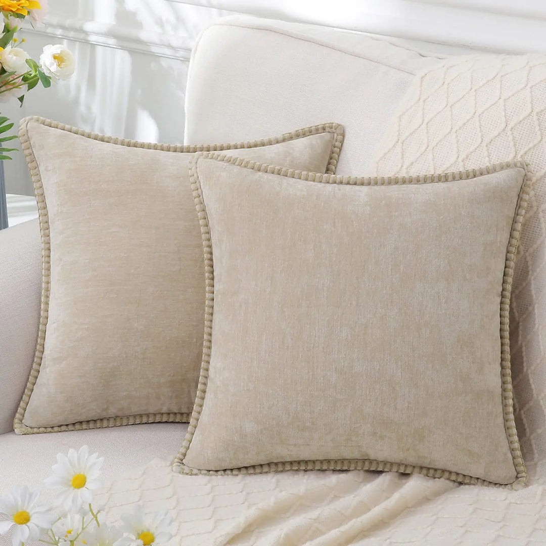 Pair of decorative chenille throw pillow covers in neutral tones for sofa styling