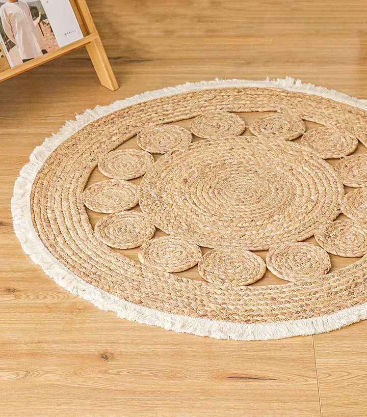 Modern round accent rug styled on hardwood flooring in living space