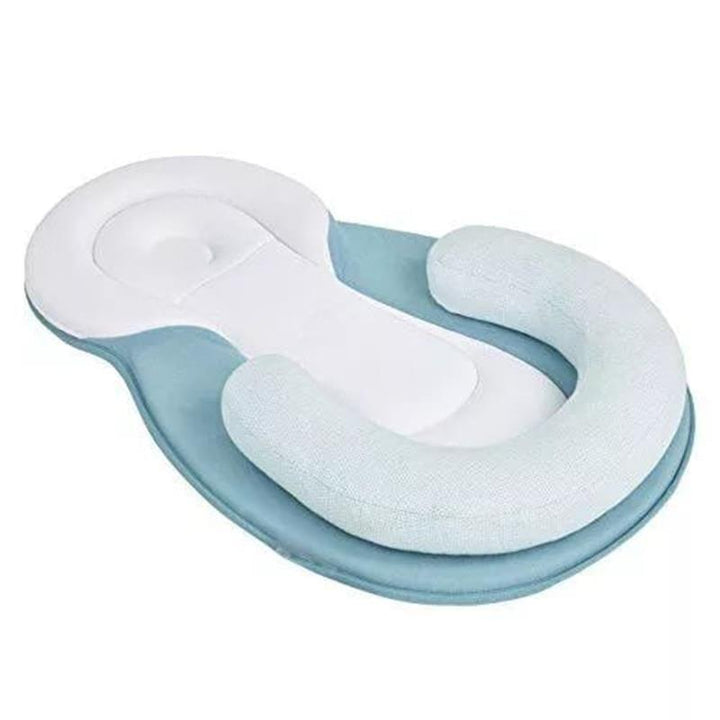 Blue baby lounger nest showcasing its supportive shape
