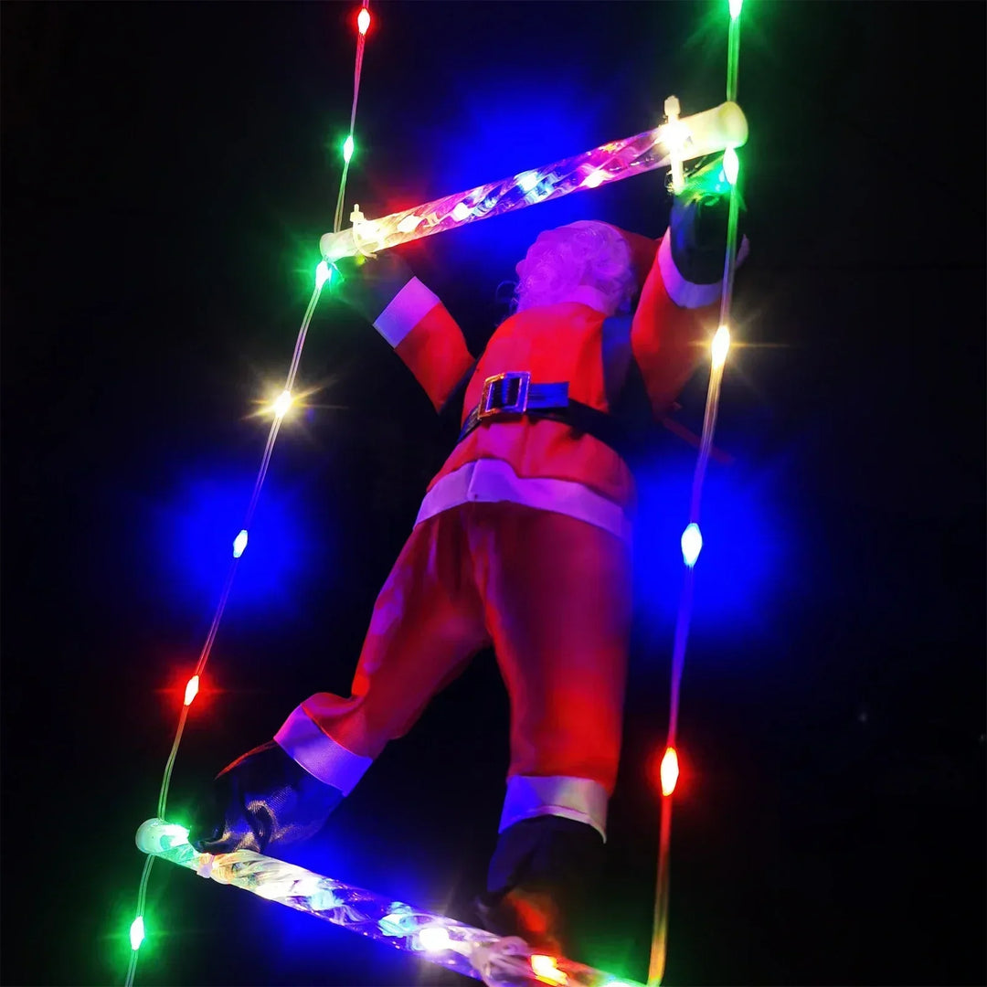 Close-up of festive Santa figures on hanging winter holiday string lights