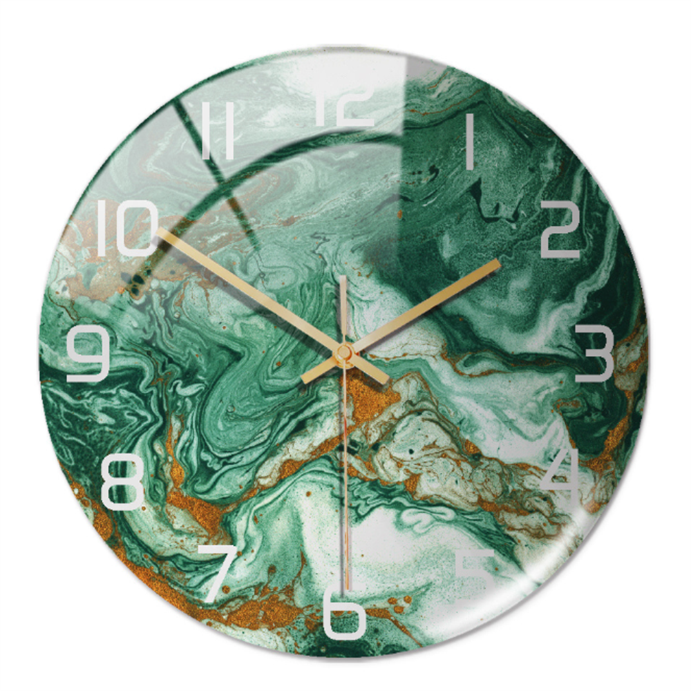 Close-up on the center mechanism and sleek hands of the designer marble-pattern wall clock.
