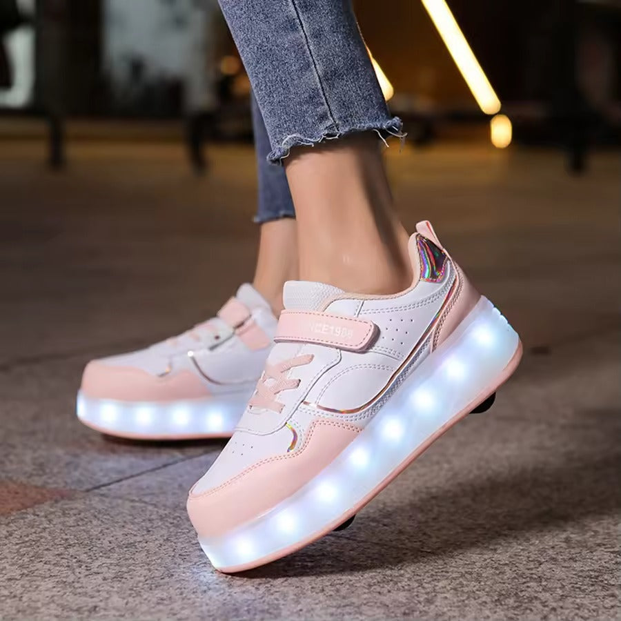 Side view of purple, pink, and white kids roller shoes with light-up soles