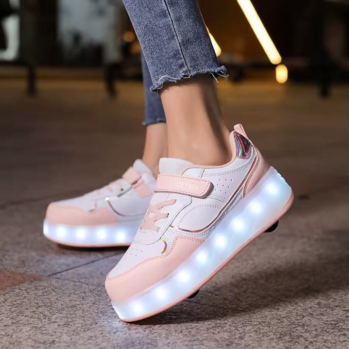 Side view of purple, pink, and white kids roller shoes with light-up soles