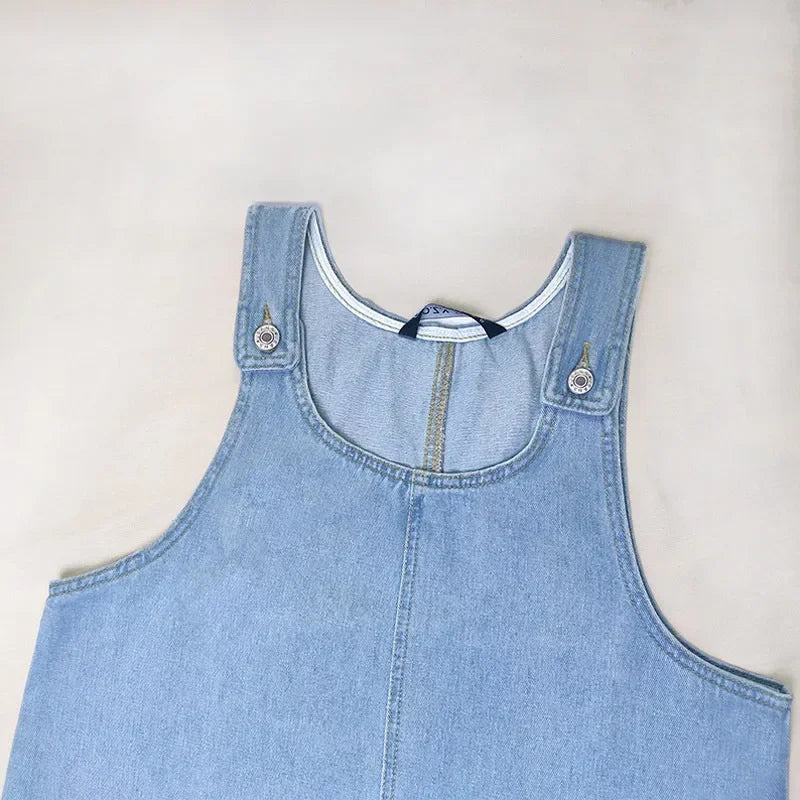 Plus size summer denim dress styled with casual accessories