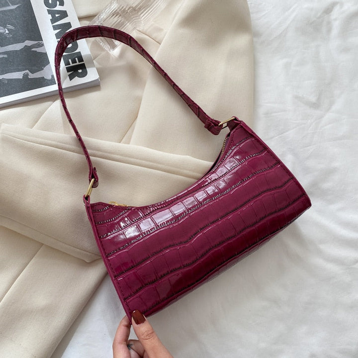 Textured vegan leather finish on eco-friendly women's fashion purse