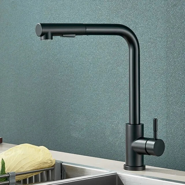Close-up of the sleek stainless steel mixer lever on a contemporary kitchen faucet