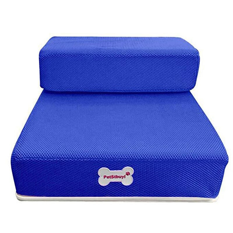 Accessory dog steps positioned beside a master bedroom wooden bed