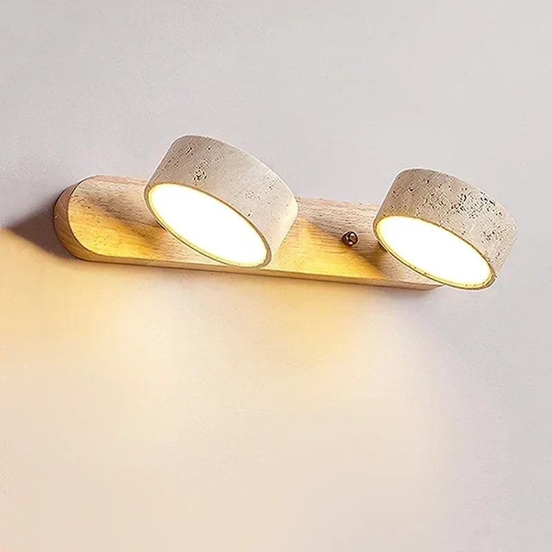 Close-up of the modern LED wall lamp illuminating a clean wall