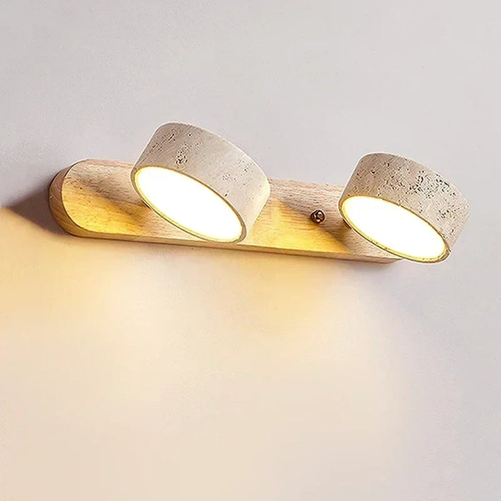 Close-up of the modern LED wall lamp illuminating a clean wall