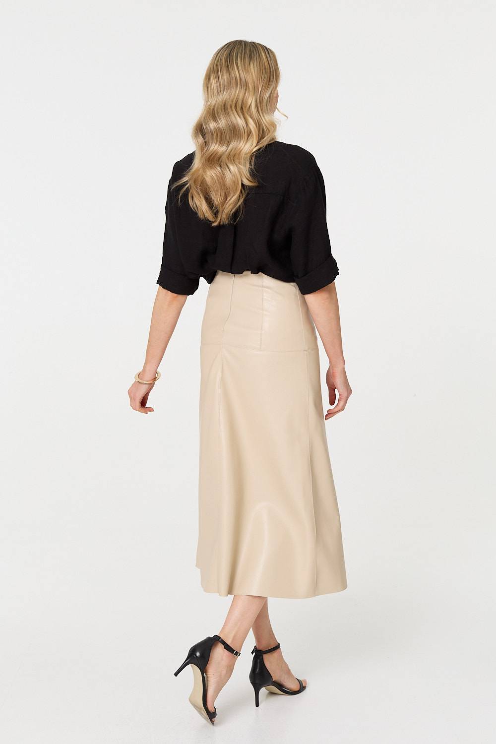 Professional workwear ensemble with black midi skirt