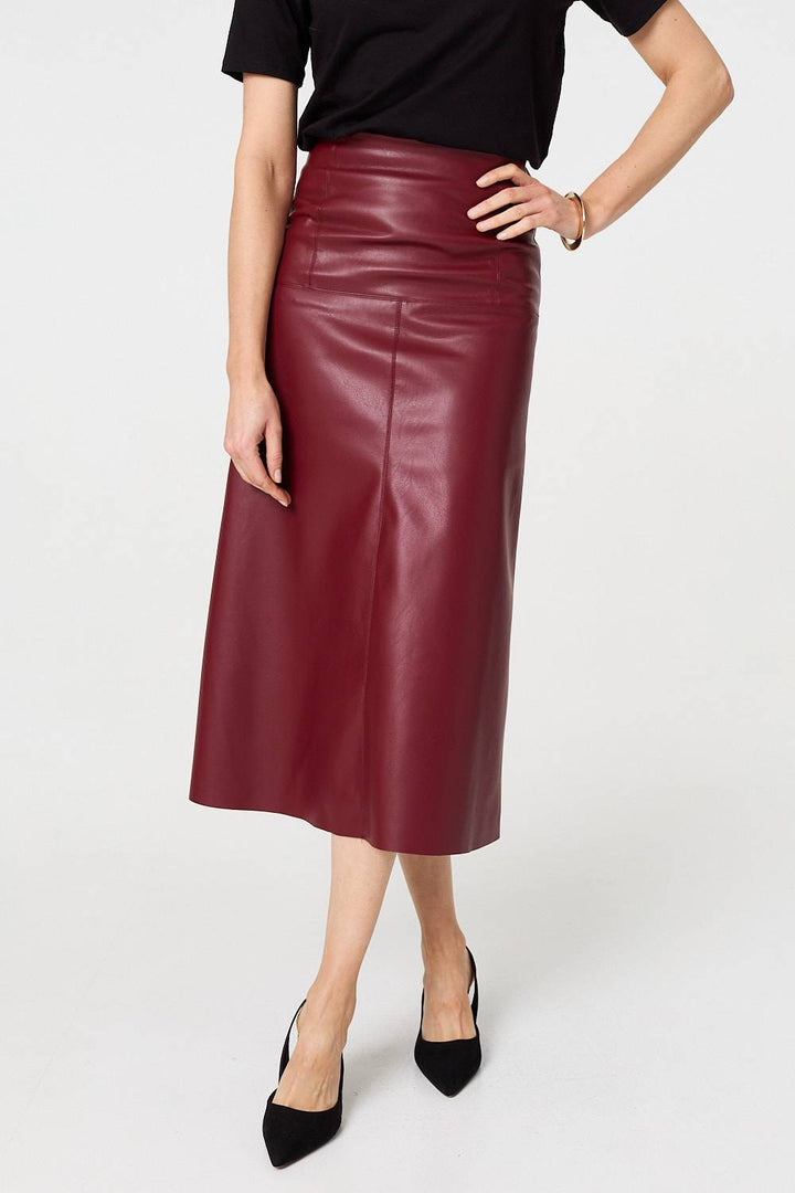 Full length view of black workwear midi skirt
