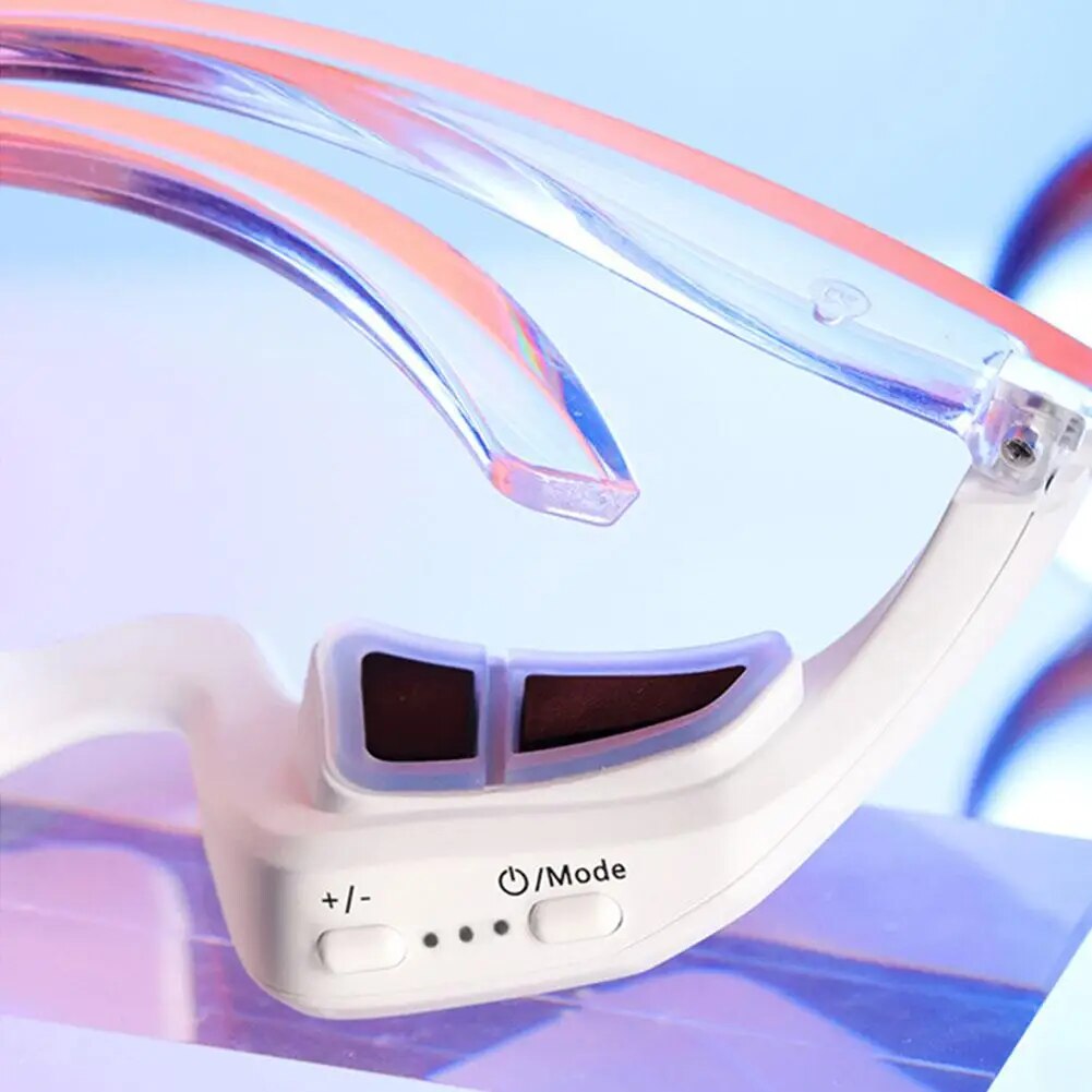 Handheld facial massager and eye care device with ergonomic design