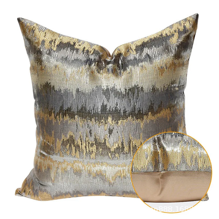 Close-up detail of a textured metallic abstract cushion cover showcasing zipper and fabric quality