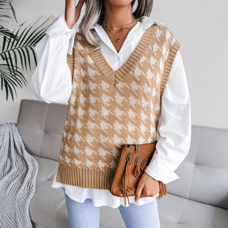 Woman wearing brown checked V-neck knit waistcoat over white shirt