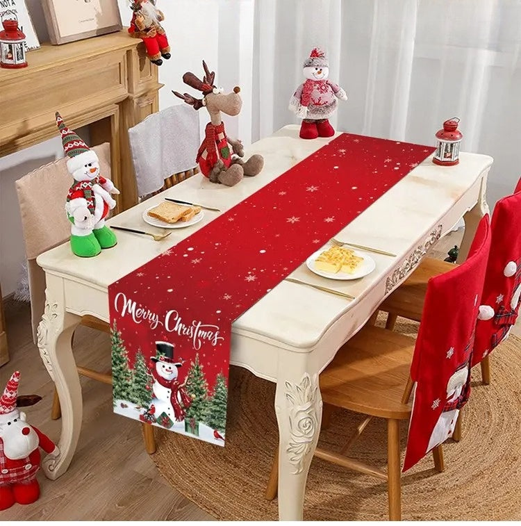 Hollybrook Christmas table runner displayed on a festive table