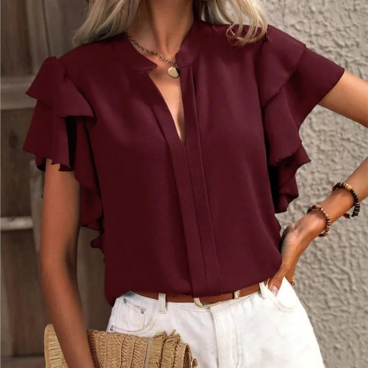 Side profile view of the fashionable summer blouse for women